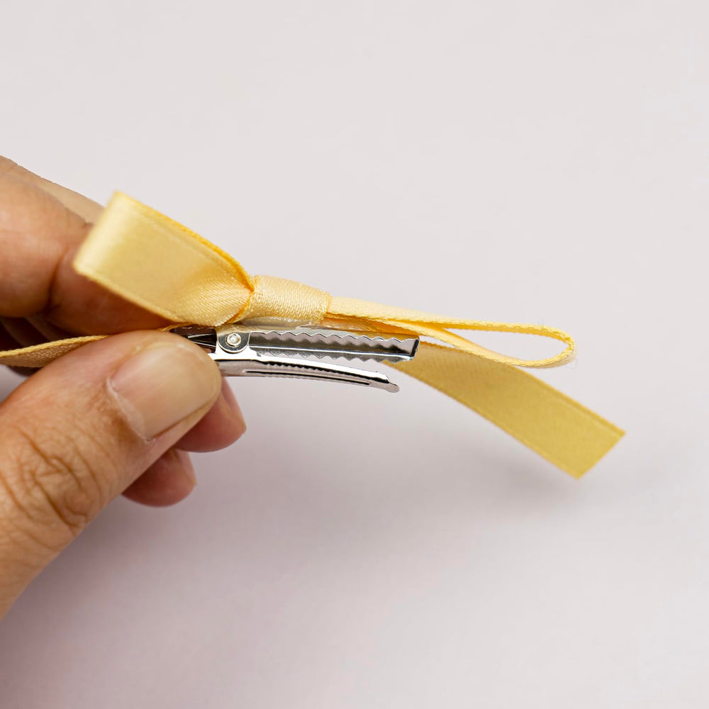 JGQUR multiple clips used on braids, buns and ponytails showing versatile styling