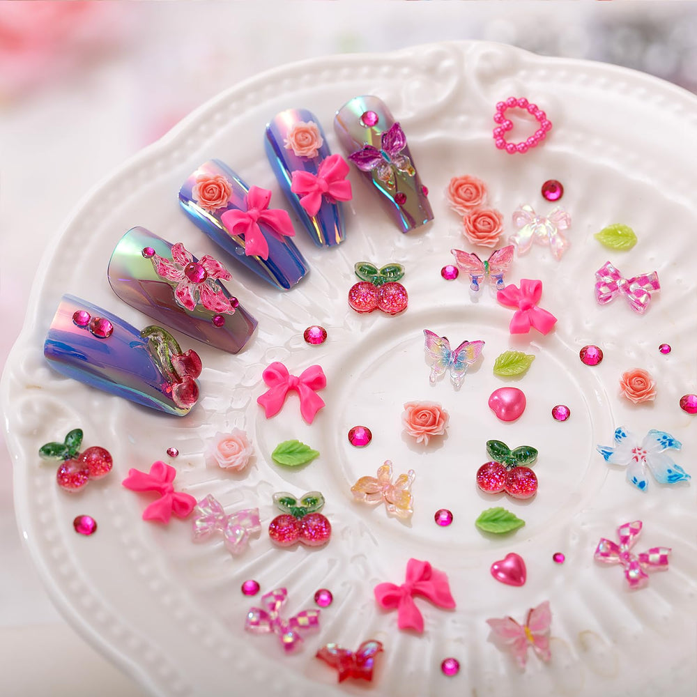 JINJINANV kit pieces on a hand illustrating scale and how they enhance nails
