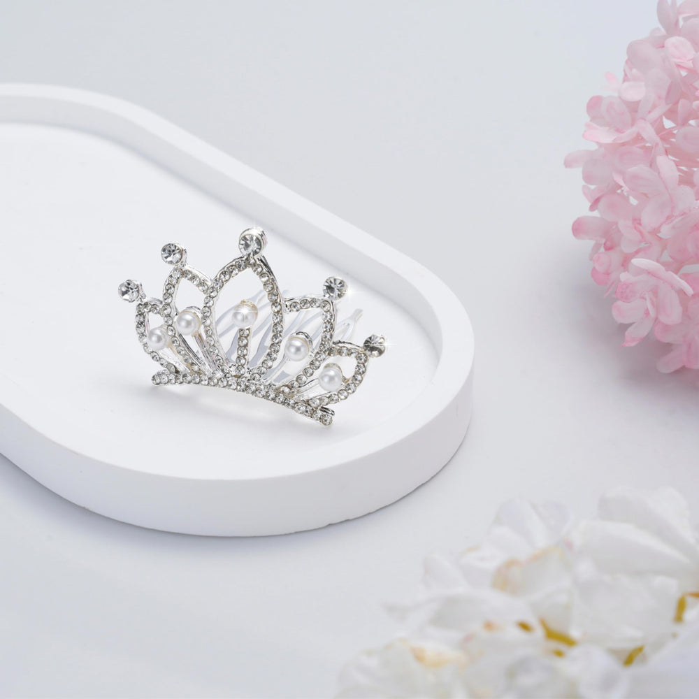 JINYEAH tiny tiara worn with an updo adding elegant sparkle benefit