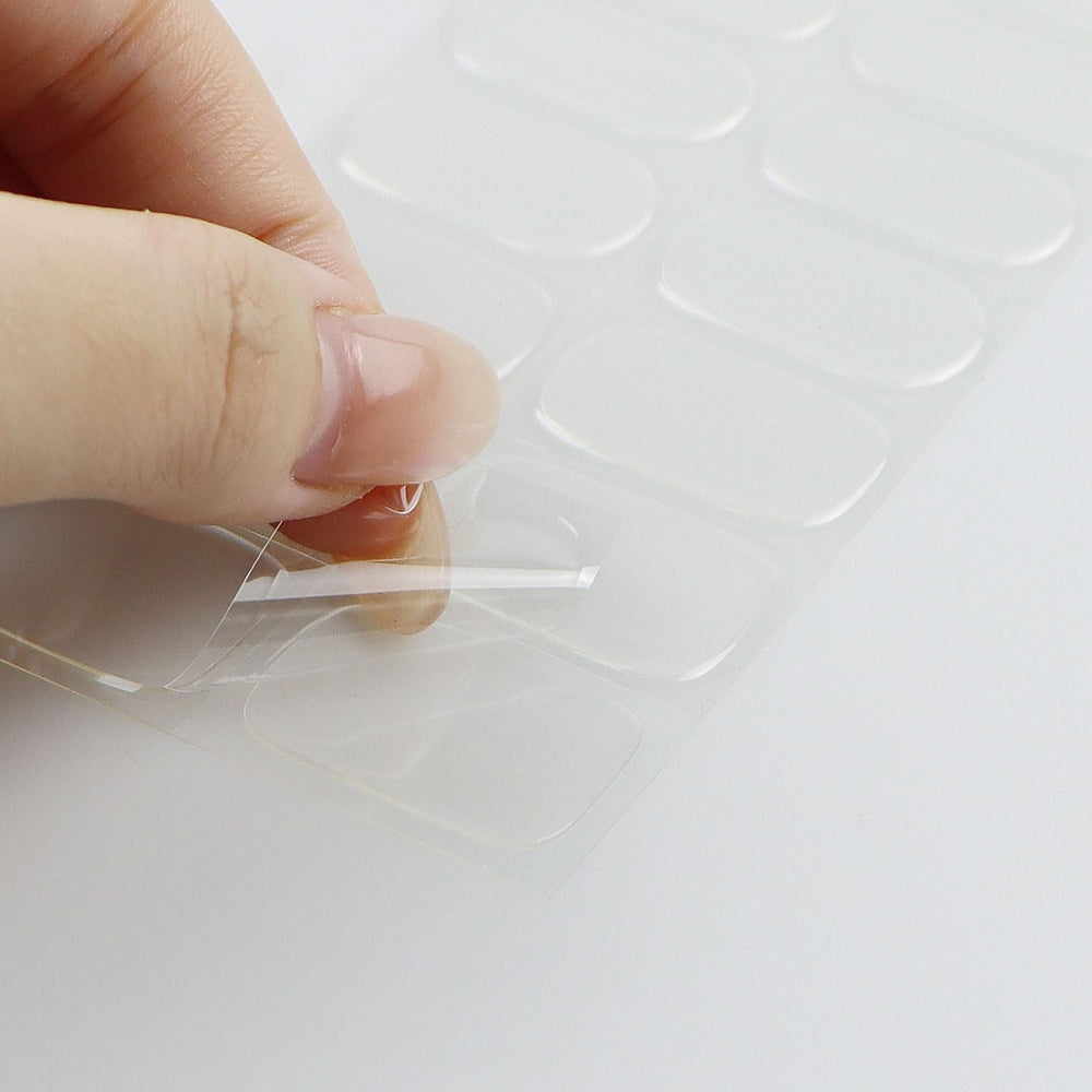 jmeowio applying strip to nail demonstrating easy peel-and-press benefit