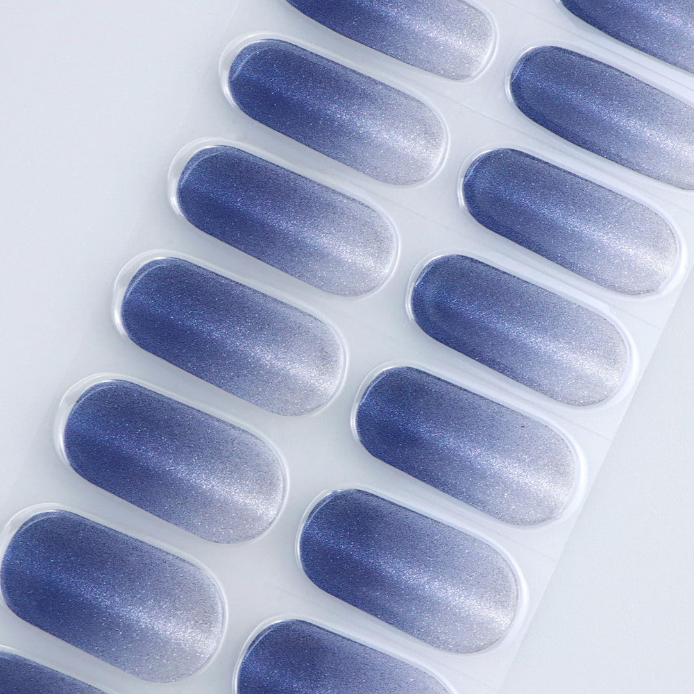 jmeowio fully cured nails in lifestyle setting showing glossy cat-eye effect and salon look benefit
