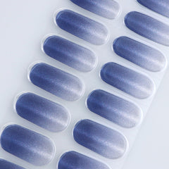 jmeowio fully cured nails in lifestyle setting showing glossy cat-eye effect and salon look benefit