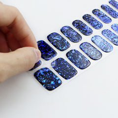 jmeowio nail wraps curing under LED lamp for stronger, long-lasting shine