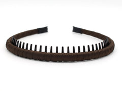 JOBAND headband next to hand showing scale and lightweight size