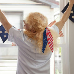 Jocbean scrunchie worn in a ponytail showing secure hold and stylish patriotic accent