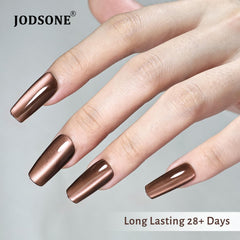 JODSONE on model hands displaying finished cat-eye nails for elegant everyday wear