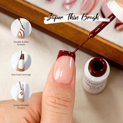 JODSONE nail artist drawing a fine brown line on nail showing accuracy for detailed designs