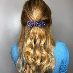 Joez Wonderful worn in a half-up hairstyle demonstrating elegant effect