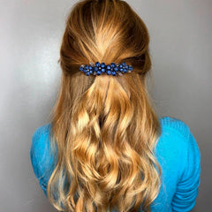 Joez Wonderful worn in an updo illustrating elegant hold and shine