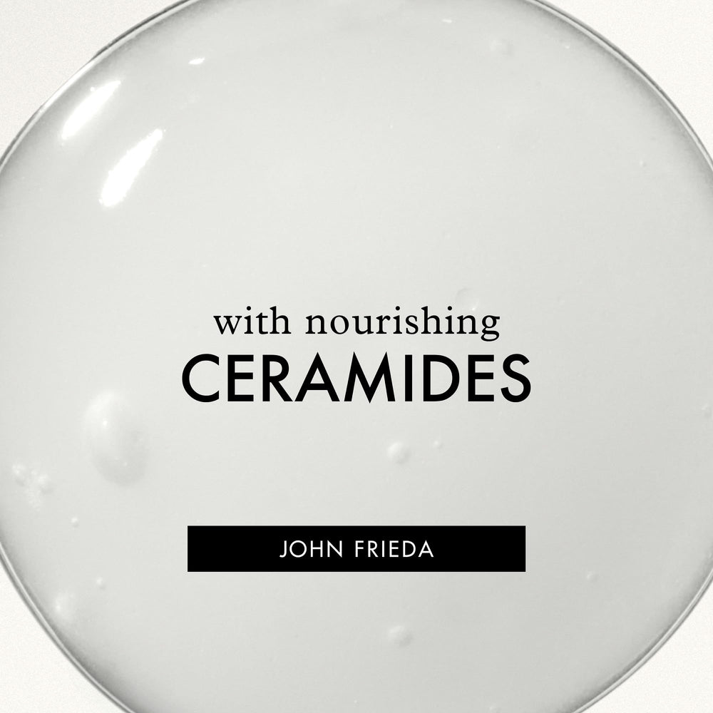 John Frieda label close-up featuring vitamins and green tea nourishment