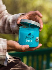 JOHNNY B. Mode scale comparison jar to show portable size