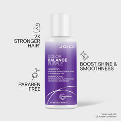 Joico 2 oz bottle next to hand to show compact travel size and convenience benefit