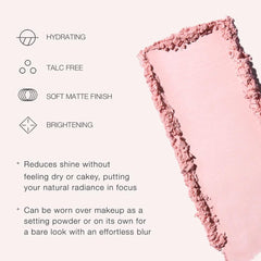 Jouer powder being picked up with brush demonstrating easy application and light coverage benefit