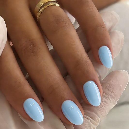 JOYVVEW front packaging showing pastel blue press-on nails and compact case for travel