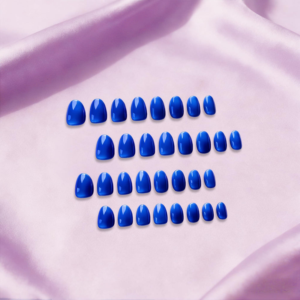 JOYVVEW nails applied on hand demonstrating natural short oval fit and comfortable wear