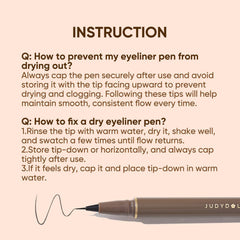 JUDYDOLL eyeliner on a vanity with brushes suggesting everyday beauty use