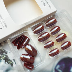 juggssa press-on nails worn on a hand model demonstrating natural, elegant effect
