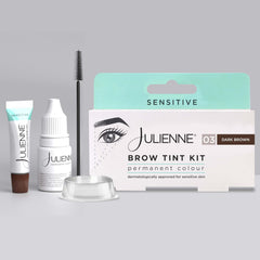 Julienne tint bottle close-up showing Dark Brown pigment and precise dosing