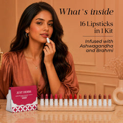 Just Herbs mini lipstick open top view revealing creamy balm-like texture