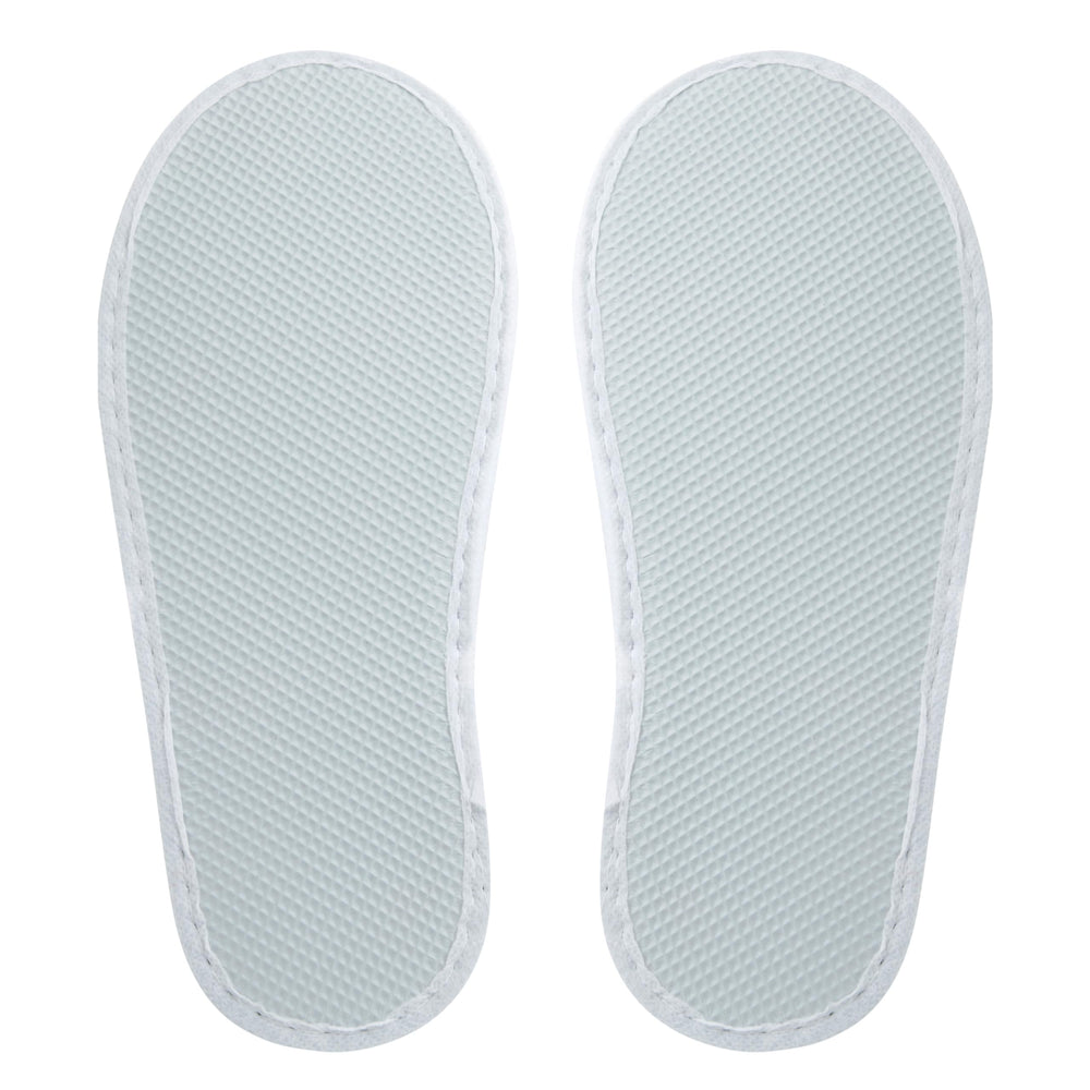 Juvale slippers packed in suitcase for travel convenience