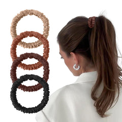 Kafteri front packaging showing four mulberry silk scrunchies — elegant gift-ready set