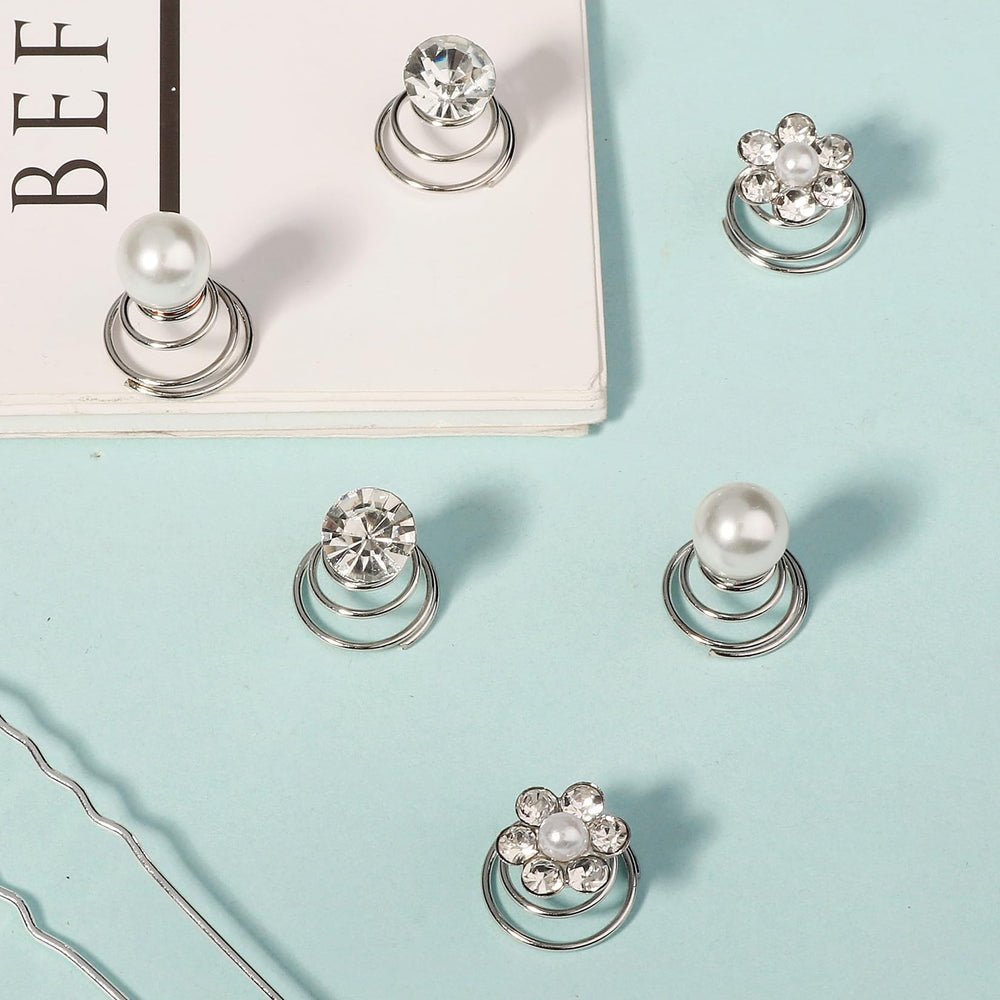 KALOLIA pins laid beside a ruler showing scale for precise styling expectations