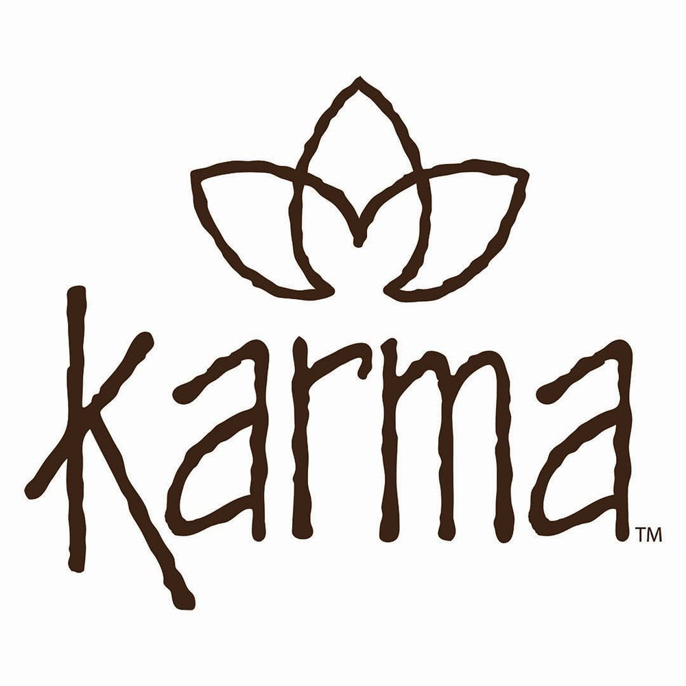 Karma headband in beach setting showing sun-ready coverage and casual style