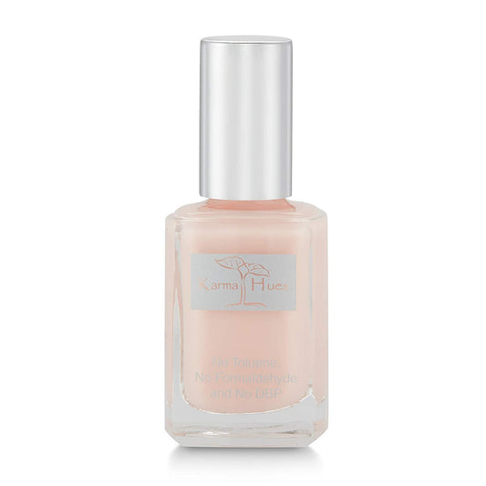 karma organic front bottle showing glossy pink shade and clean packaging benefit