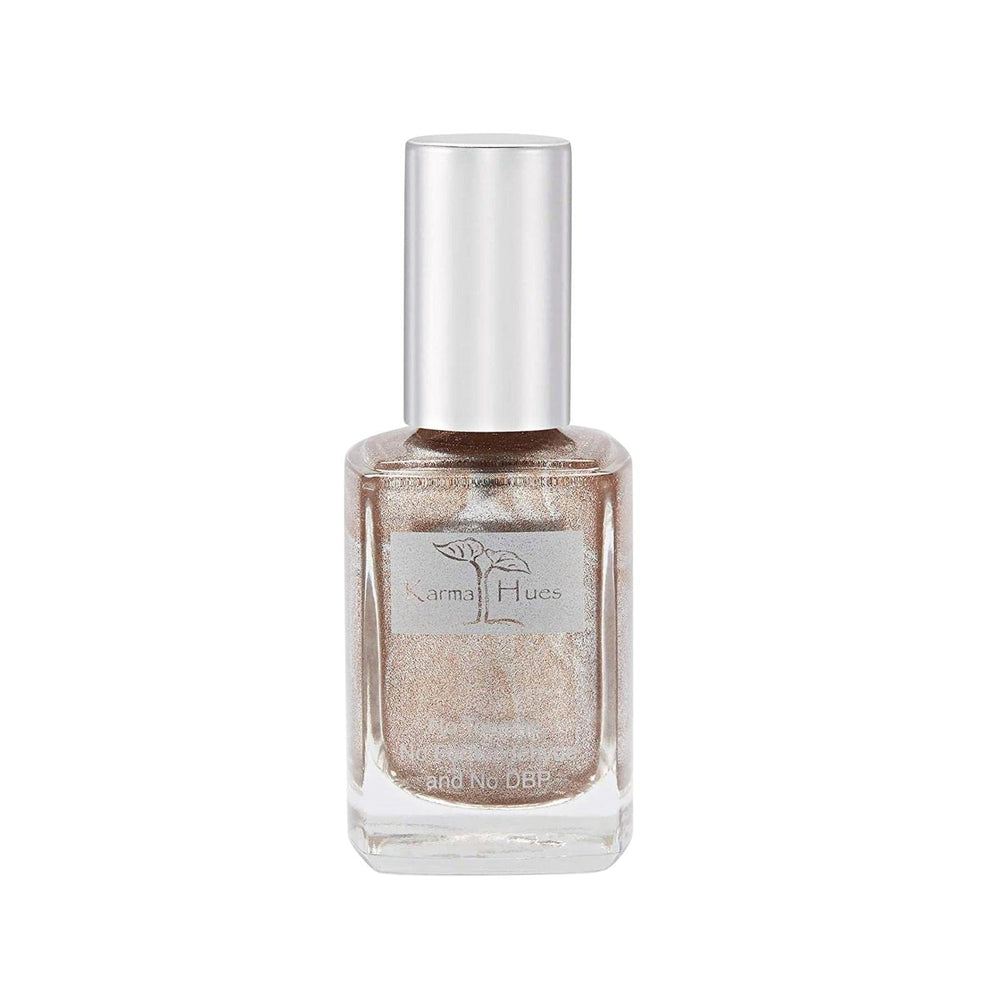 Karma Organic front bottle showing Champagne Toast shade and eco packaging benefit