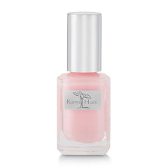 karma organic front bottle showing elegant glass and color, clear eco packaging benefit