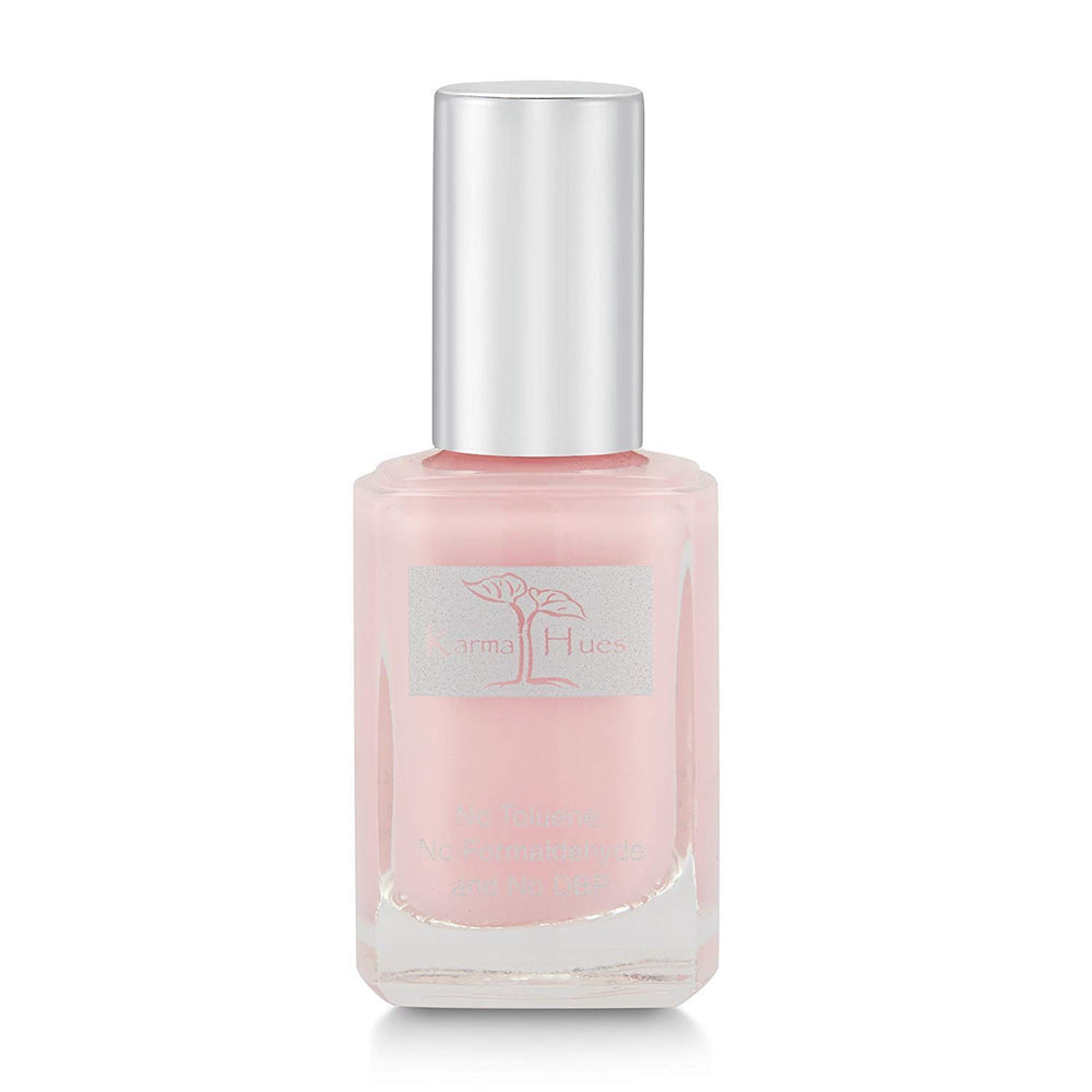Karma Organic front bottle showing brand and quick-dry finish benefit