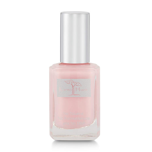 Karma Organic front bottle showing brand and quick-dry finish benefit
