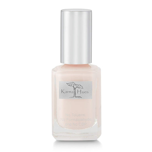 karma organic front bottle shows Marshmallow shade and glossy finish benefit