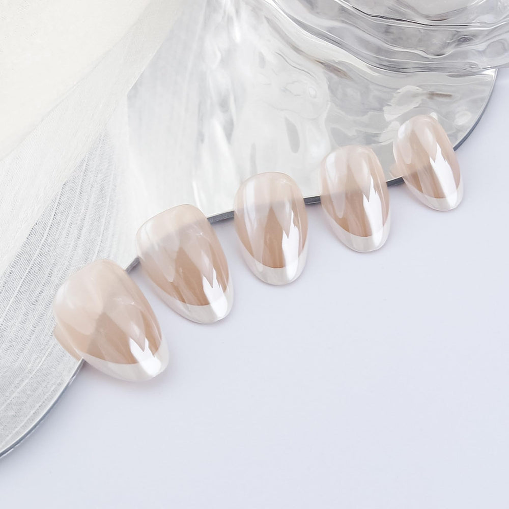 KASOICRA nails worn on hand demonstrating short almond shape and natural look