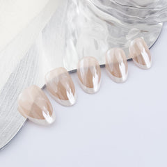 KASOICRA nails worn on hand demonstrating short almond shape and natural look