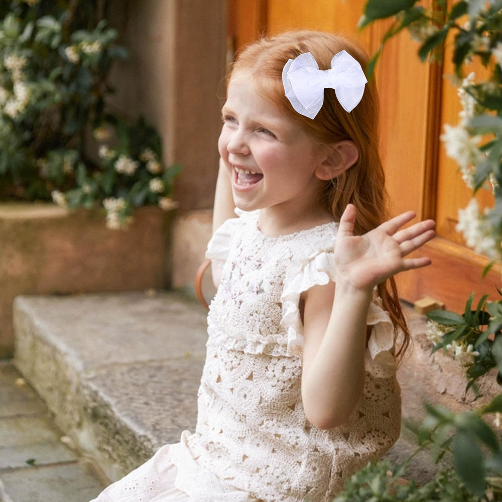 KCHIES lined alligator clip detail showing secure gentle grip without pulling