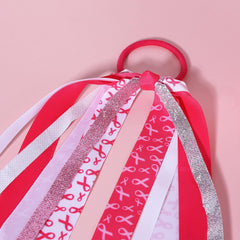 KCHIES attached to backpack showing versatile use and visible support
