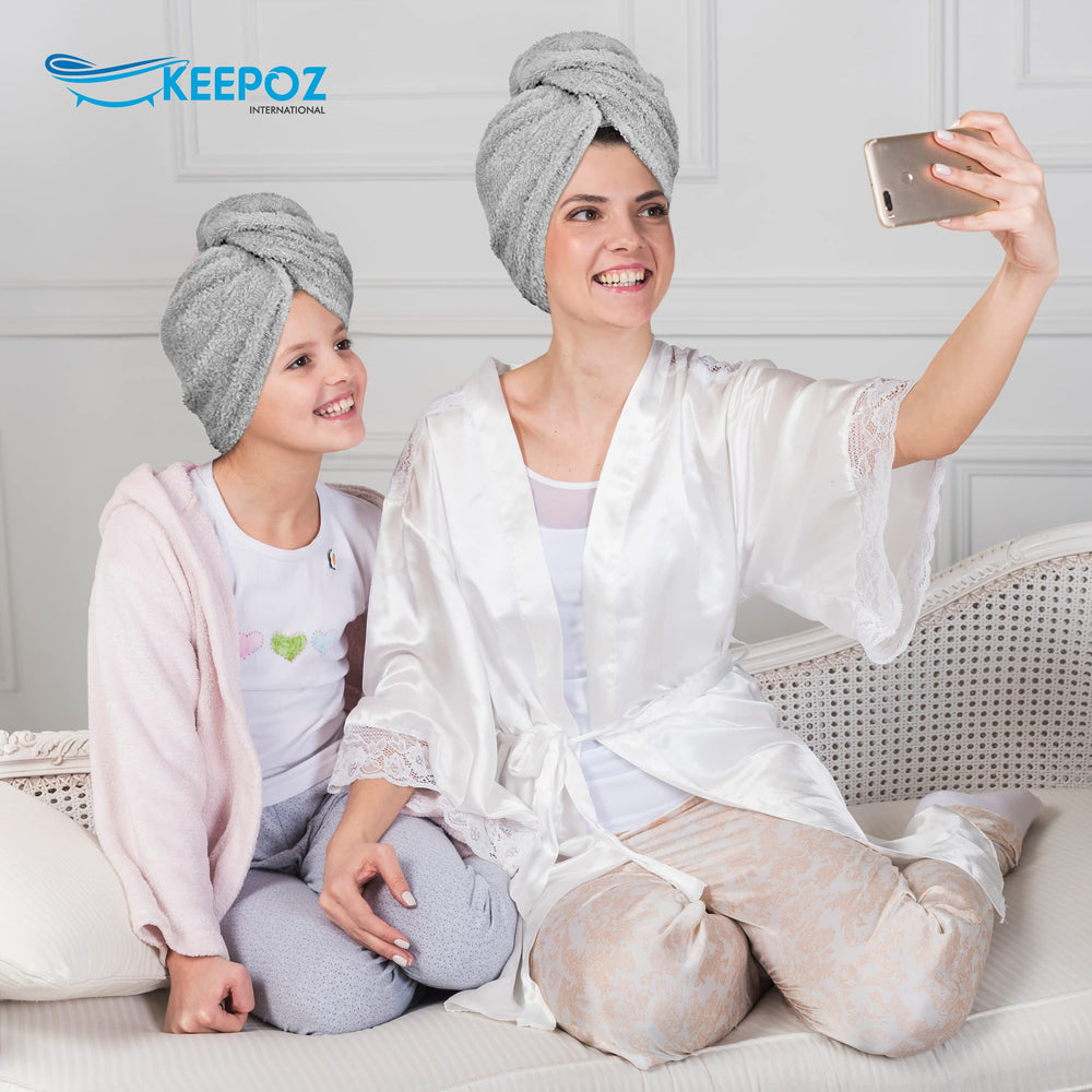 KEEPOZ wrapped long curly hair side view showing containment and reduced drips