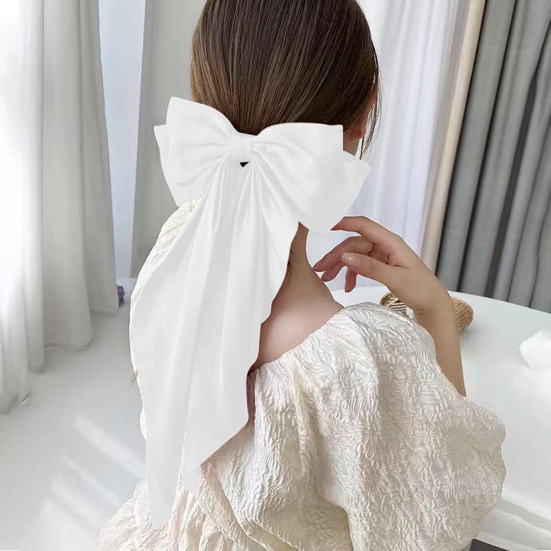 Kefley half-up hairstyle with long ribbon tail adding graceful movement