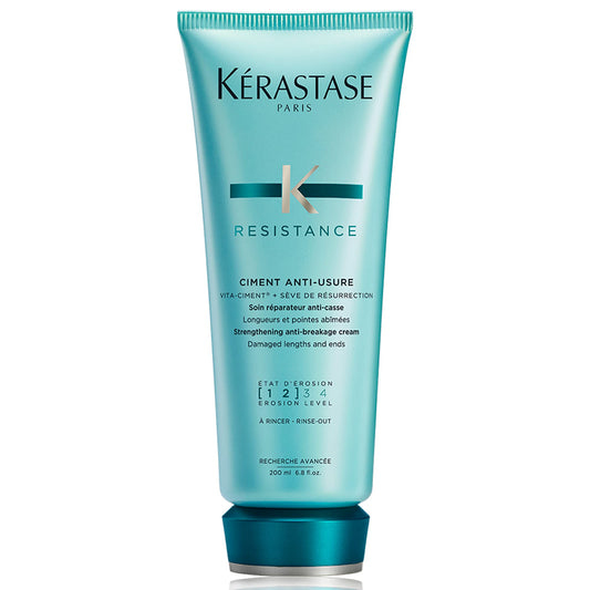 KÉRASTASE front bottle showing product benefits and brand
