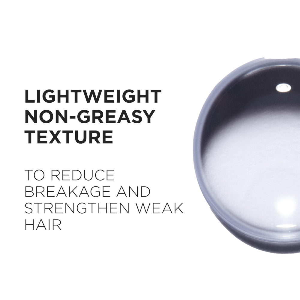 KÉRASTASE Genesis applying to scalp demonstrating targeted use for reduced breakage benefit