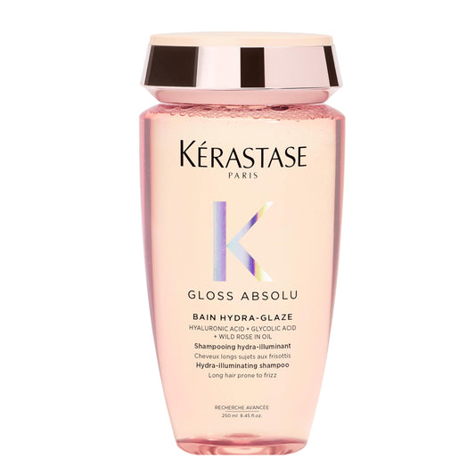 KÉRASTASE front bottle shot showing product and glossy finish benefit