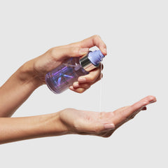 KÉRASTASE shiny blonde hair after serum use showing improved radiance