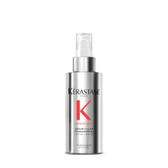 KÉRASTASE bottle front view showing sleek design and label benefit