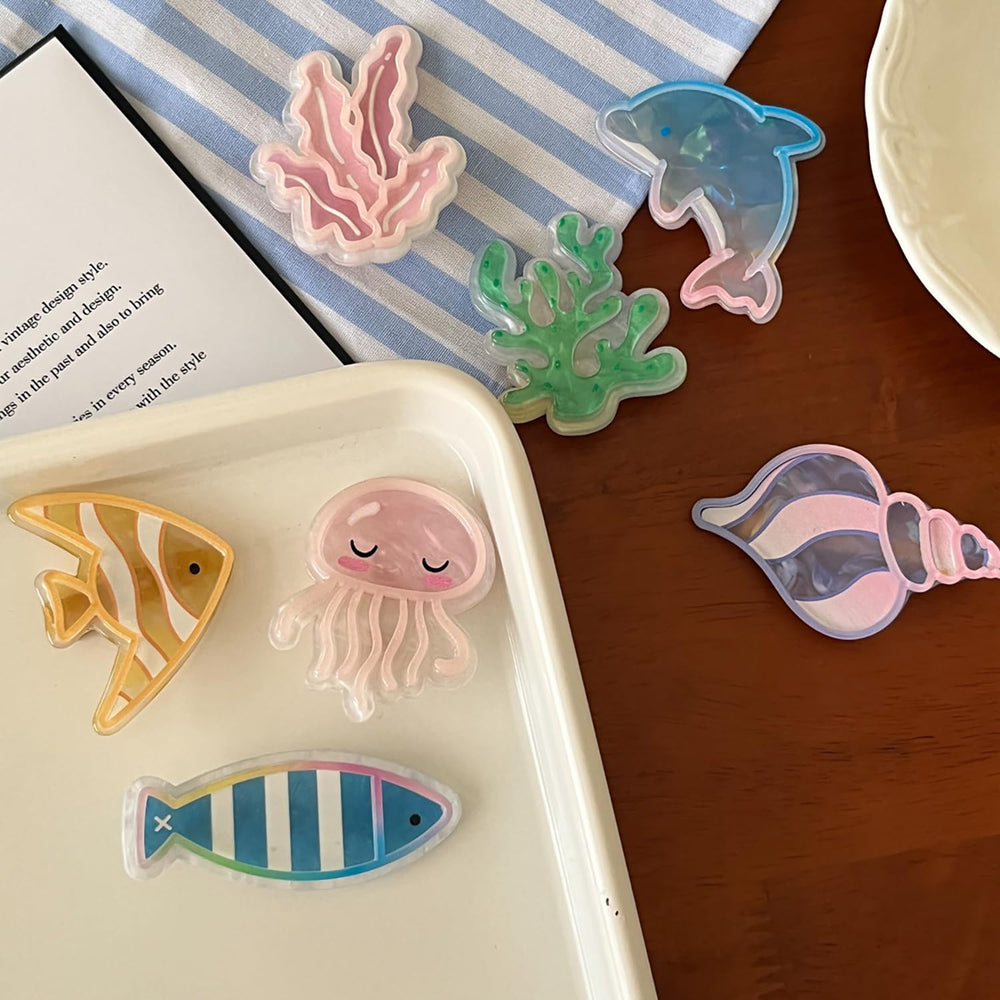 Kesvila seaside lifestyle setting showing clips as summery outfit accessory
