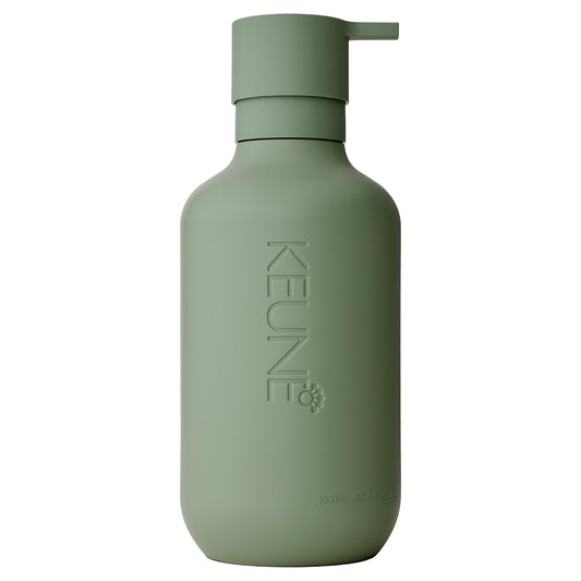 KEUNE refillable dispenser front view showing clean design and sustainability benefit