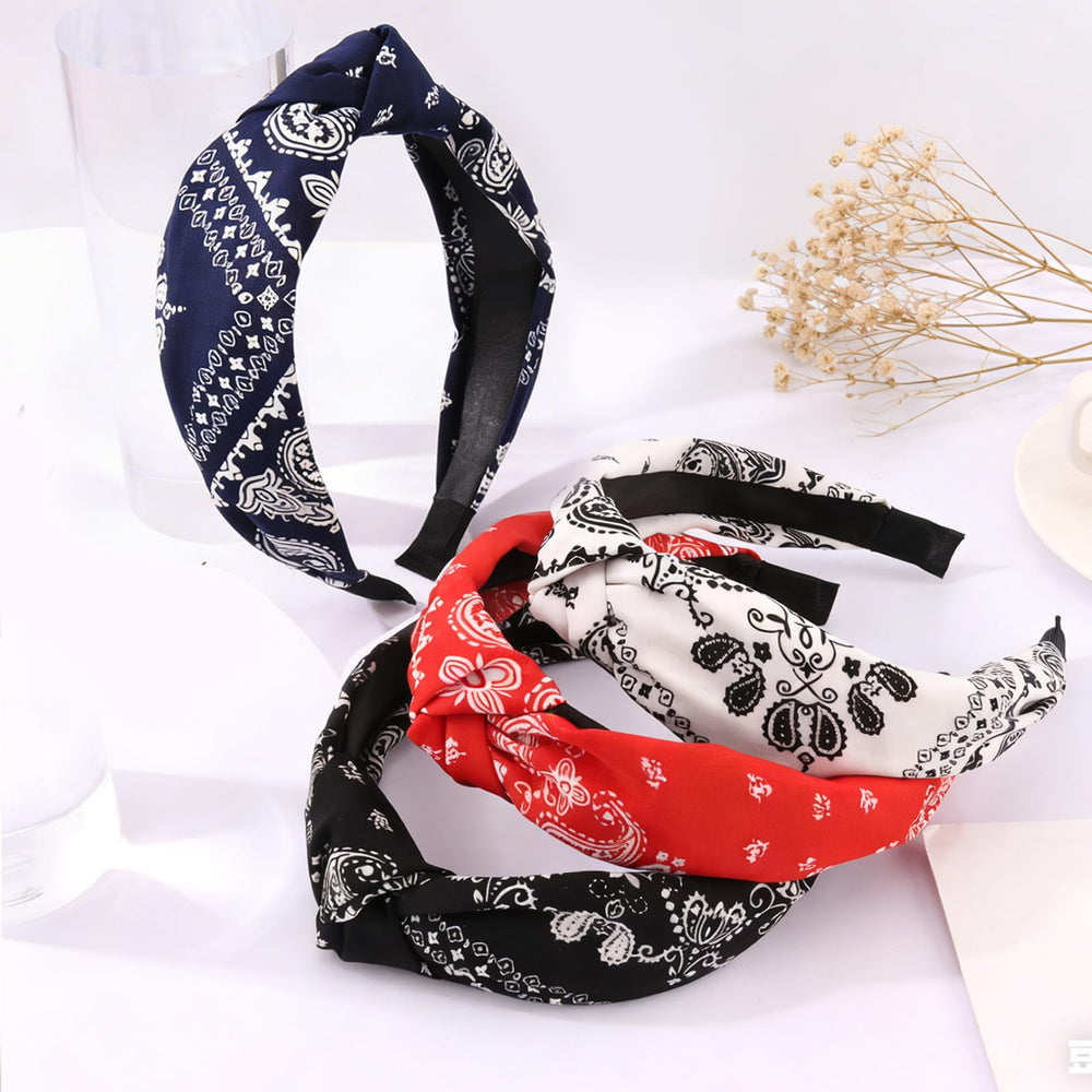 KICOSY four headbands laid flat showing color options and matching versatility