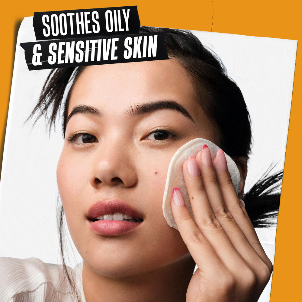 Kiehl's toner poured onto cotton pad demonstrating gentle application