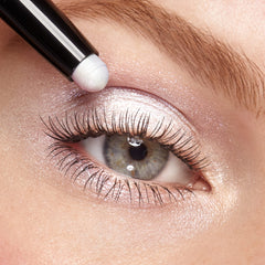 Kiko Milano holo white applied on eyelid demonstrating long lasting shimmer and transfer resistance