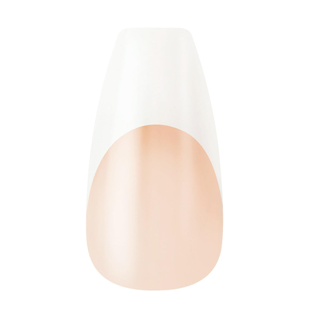 KISS hand model applying a press-on nail showing fast at-home manicure benefit